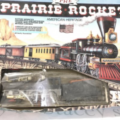A Boxed Timpo The Prairie Rocket (Box Worn and Parts Missing). And A Hornby Daylight Pacific Express Set(Parts Missing). No Reserve. (2).
