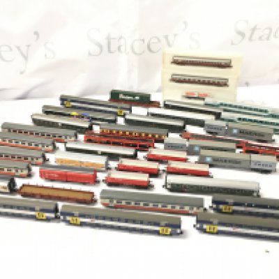 A Collection of Loose and Boxed N Gauge Coaches And Wagons. Including Fleishman. Trix. No Reserve.