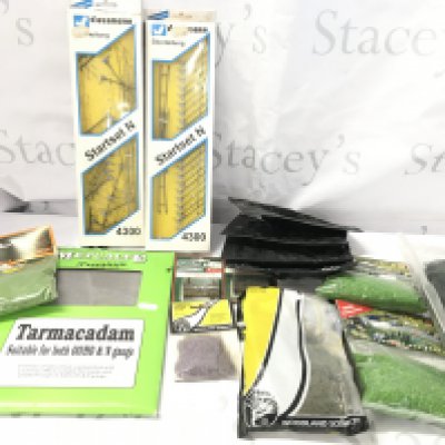 A Box Containing N Gauge Accessories. Includes Track. A Control Unit. Relays Etc.