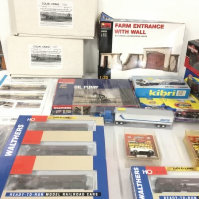 A Collection of HO scale model including railway Wagons and building plus road vehicles. No reserve.