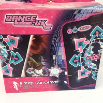 A boxed DANCE UK 8 step dancemat. For use with PlayStation games consoles. No reserve