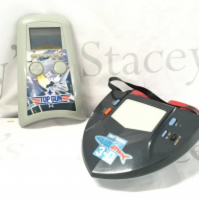 A Konami Top Gun Handheld lcd Game and a Tomytronic Shark Attack 3-D. No Reserve.