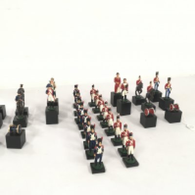A set of painted lead soldiers from the Napoleonic war forming a set of Chess pieces. English side lead by Wellington and the French by Napoleon.No reserve