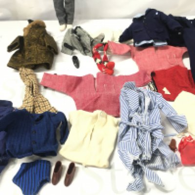 A Vintage Pedigree Sindys Boyfriend Paul Doll. With A Collection of Clothes.