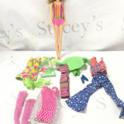 A Vintage Mattel Twist And Turn Francine Doll, with Barbie Clothes.