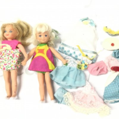 A Barbie Tutti And Chris Dolls With Clothes.