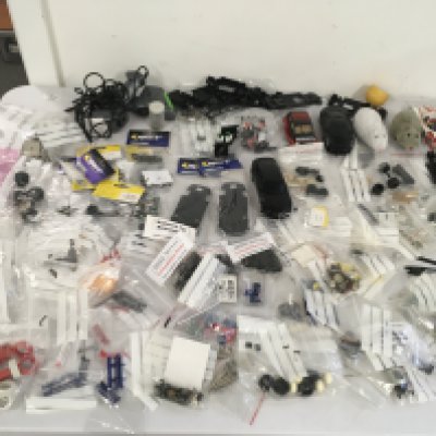 A large selection of Scalextric cars ..accessories..spares or repairs