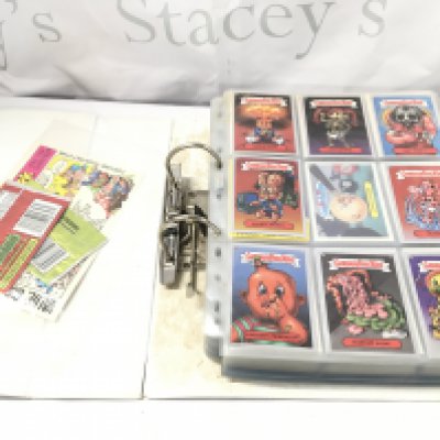 A Binder Containing Vintage And Modern Unused Topps Garbage Pail Kids Stickers. And Some Lord Of The Rings the 3rd Age Cards.