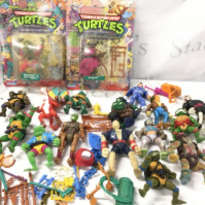 2 Carded Playmates Teenage Mutant Hero Turtles Figures (Some Damp Damage) And A Collection of Loose Figures.