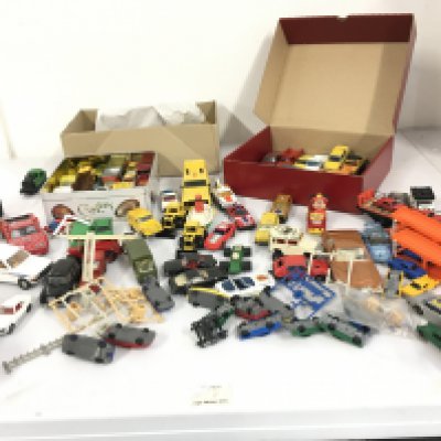 A collection of Playworn diecast and plastic model vehicles by Corgi..Britains..Matchbox etc.