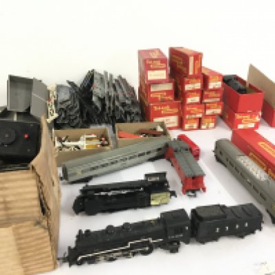 A collection of 00 gauge model railway including locos..coaches..wagons..track and accessories. No reserve