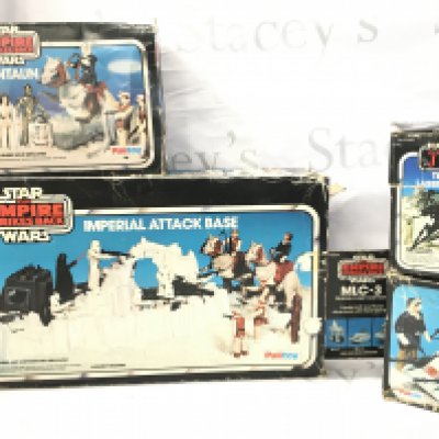 A Collection of Vintage Star Wars Items. A Boxed Imperial Attack Base (Appears To Be Complete.) An Original Tauntaun. A Tri-Pod Laser Cannon And A MLC-3. Boxes I&rsquo;m Various States.