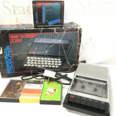 A Boxed Sinclair ZX81 With 16K Ram. A Sanyo Cassette Recorder and Software.
