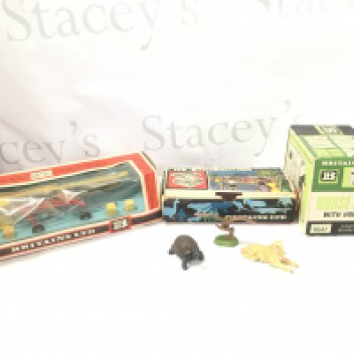 A Boxed Britains Elevator #9564. Zoo Cages And Horse Box with Horse #9547.