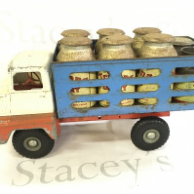 A Tri-Ang Milk Truck With Churns.