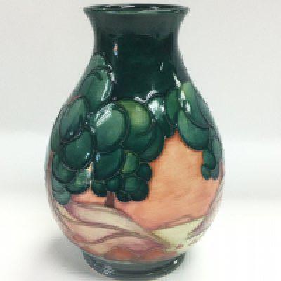 A Moorcroft Mamoura vase of globular form, approx height 18.5cm. Shipping category D.