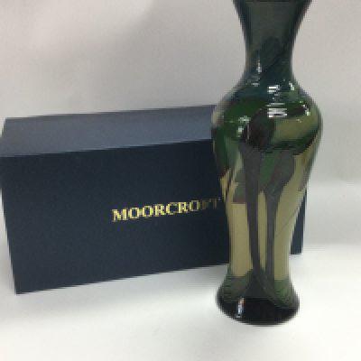 A boxed Moorcroft Moon Valley vase of elongated form designed by Nicola Slaney, approx height 26cm. Shipping category D.