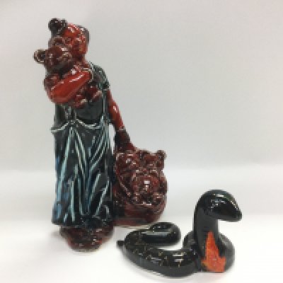 Two Anita Harris pottery figures comprising a unique 1 of 1 'Clown and teddies', approx height 22.5cm plus a rare figure of a snake, approx height 8cm (2). Signed to base. Shipping category D.
