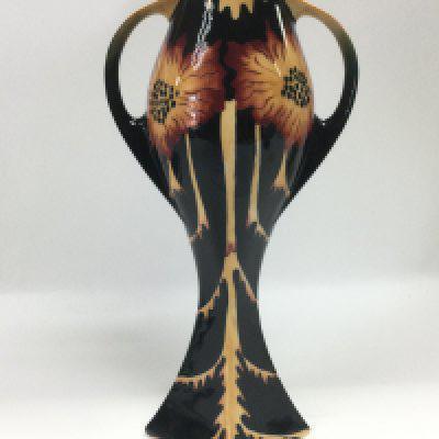 A Black Ryden Icarus vase designed by Kerry Goodwin, 2002, approx height 25.5cm. Shipping category D.