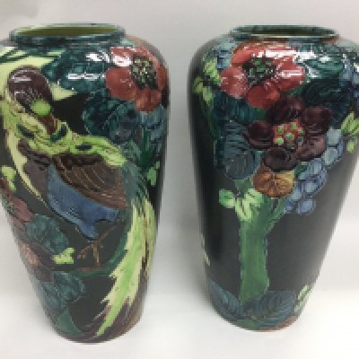 A pair of circa 1920s TF & S vases with tube lined decoration of birds and fruit, approx height 30.5cm. Shipping category D.