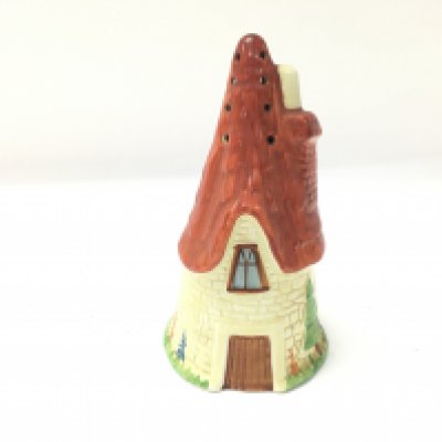 An early Carlton ware sugar caster. Approximately 13cm tall.