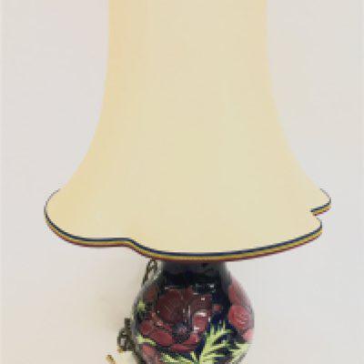 A moorcroft Anemone pattern lamp and shade 60cm tall. No obvious damage or restoration This lot cannot be posted