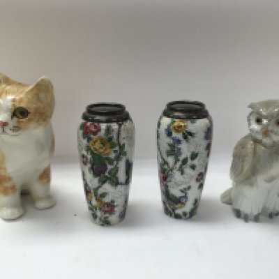 A mixed collection of ceramics including vases, figures and a piece of glassware.