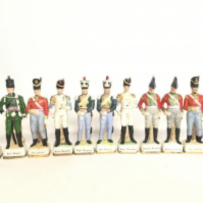 A box containing a large collection of porcelain and resin British Army solider figures, this lot cannot be posted.