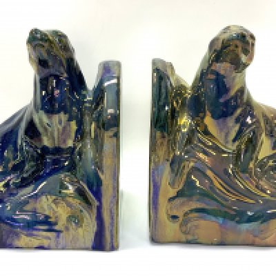 A pair of Art Deco bookends in the form of two ceramic basking seals by Alphonse Cyt&#2013265928res (1851-1941) for Rambervillers, Vosges.
