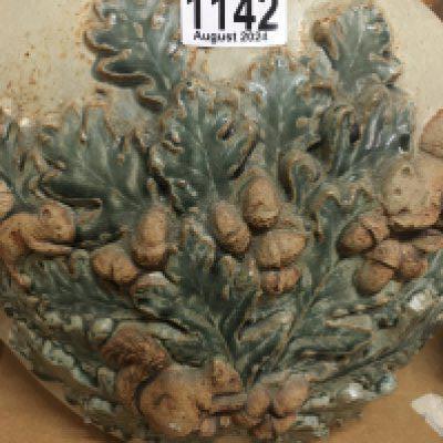 A Bernard Rooke squirrel vase .