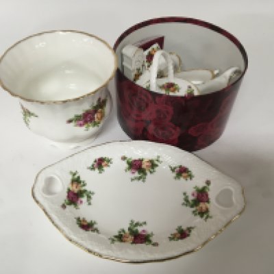 A collection of Royal Albert Old English Country rose ornaments a small jardiniere and dish with Round Royal Albert presentation box