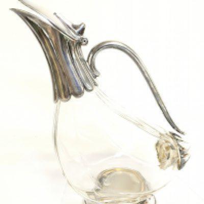 An unusual mid 20th century glass claret jug in the shape of a duck, no obvious damage or restoration.this lot cannot be posted