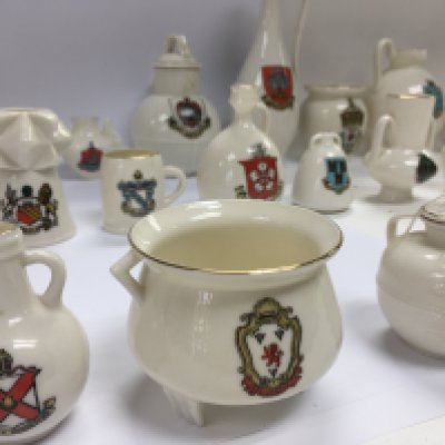 A collection of 38 items of WH Goss ware with various crests and model shapes