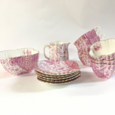 A Victorian China tea set with some minor damage.