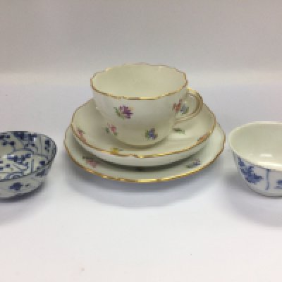 A late 19th Century Meissen cabinet cup and saucer with plate and two blue and white tea bowls. Shipping category D.