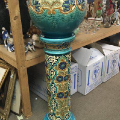A large quality Burmanstofts Faience Jardiniere and pedestal with a pressed pattern decoration with colours of blue and green no obvious damage.Hight 109cm diameter 36cm