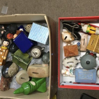 A collection of vintage porcelain money boxes. This lot cannot be posted