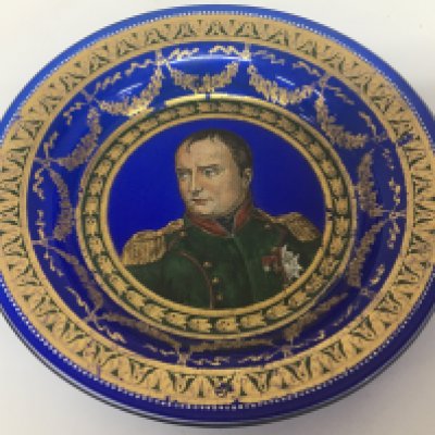 A Second Empire period enamel and gilt decorated blue glass dish depicting a portrait of Napoleon with applied French marks 3.E P.G no obvious damage diameter 19cm (Catagory D, Postage not available for this lot).