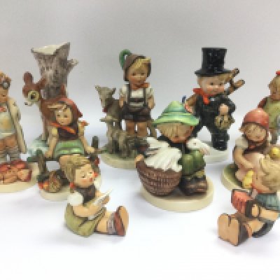 A collection of Goebel Hummel figurines. Shipping category D.