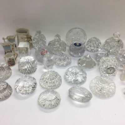 A collection of good quality glass and crystal paperweights including Wedgwood and Waterford examples. Shipping category D.