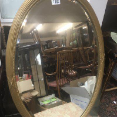An oval gilt framed wall mirror 56x81cm- NO RESERVE