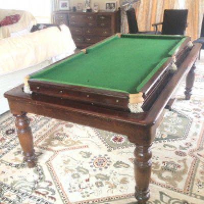 A Snooker dining table with a swivel hinged top in good condition. As a snooker table the top measures 188cmx 99cm approximately closed as table 121cm x209cm. Sold in situ buyer to collect viewing by appointment only.