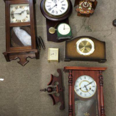 A collection of clocks including a Acctim wall clock, Bentina mantle clock etc. This lot cannot be posted