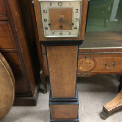 An art deco style clock, 112cm tall.