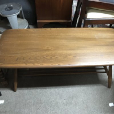 An Ercol coffee table , dimensions 104x44x35cm