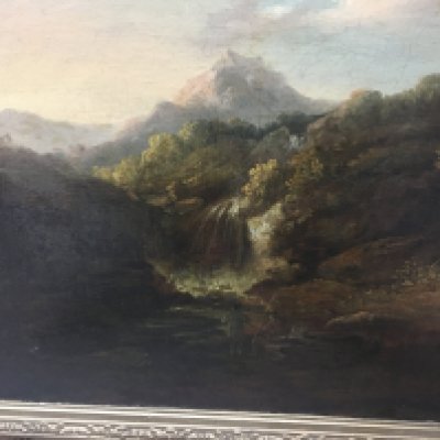 A gilt framed oil on canvas depicting country side view with figures.