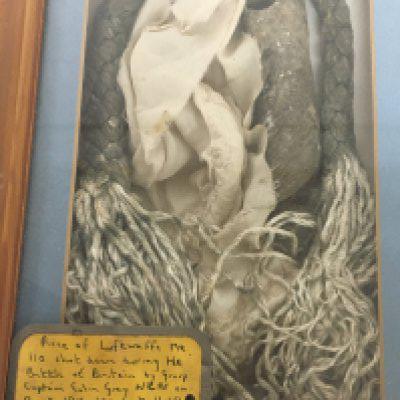 A framed World War ll fragment believed to be from a German Aircraft shot down on August 18th 1940. With attached written inscription.