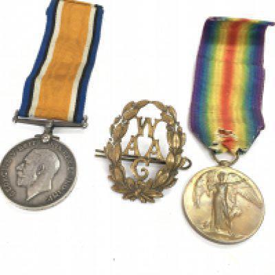 WW1 medals victory and defence presented to WKR.M.E MANLEY.Q.M.A.A.C & a Queen Mary Womens army auxiliary corps cap badge. Postage category a