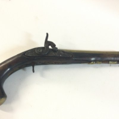 A French flintlock brass barrel percussion pistol.
