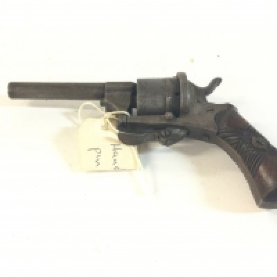 A six shot pin fire pistol.